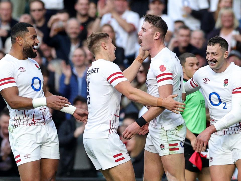 Freddie Steward (second-right) celebrates scoring England’s first try against Japan (Getty Images)