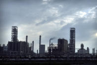 In this July 23, 2019, photo, olefin production facilities are seen inside the Fushun Petrochemical Company in Fushun in northeastnern China's Liaoning Province. China’s northeastern rust-belt region is trying to capitalize on a multibillion-dollar national initiative to build ports, railways and other projects abroad. (AP Photo/Olivia Zhang)