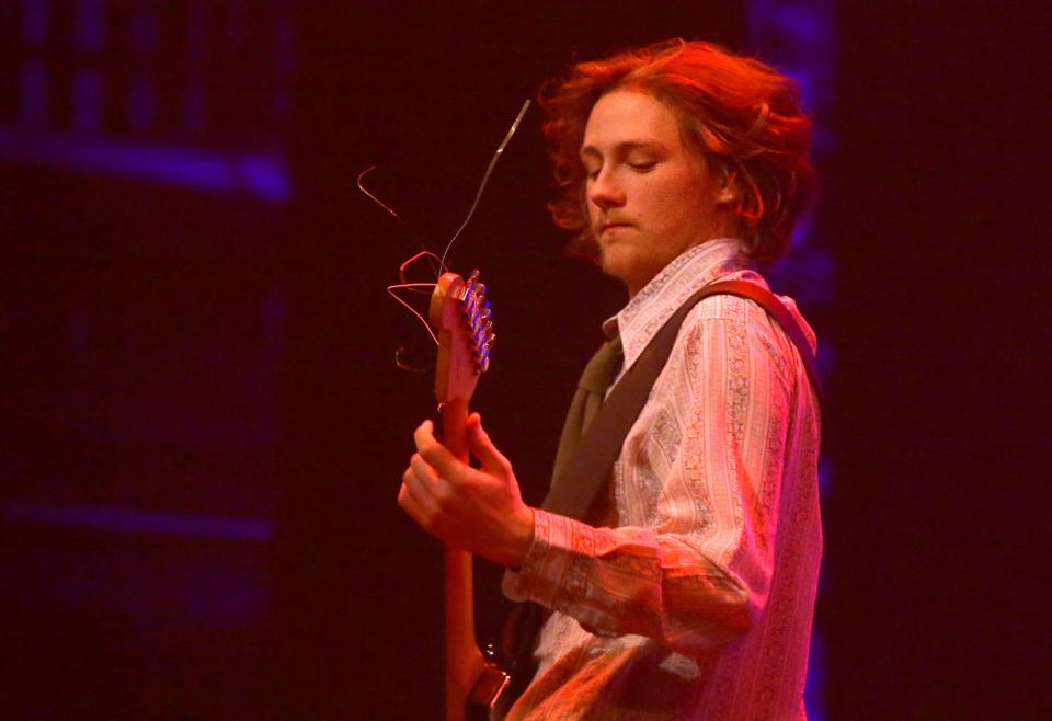 Bovinophobic Bile Puddle’s Oliver Booth plays guitar Sunday, Feb. 18, 2024 during a local showcase at the Englert Theatre in Iowa City, Iowa.