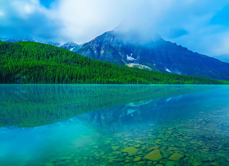 <span class="caption">Canada's latest federal budget did little to tackle climate action or income inequality, two problems with strong ties. Alberta's Bow Lake is seen in this photo.</span> <span class="attribution"><span class="source">Josh Woroniecki/Unsplash</span></span>