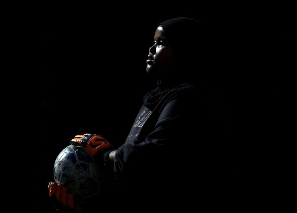 Sisterhood FC goalkeeper, Fahiima Yusuf, 19, holds the ball during a Ladies Super Liga 5-a-side match at The Colombo Centre (Reuters)