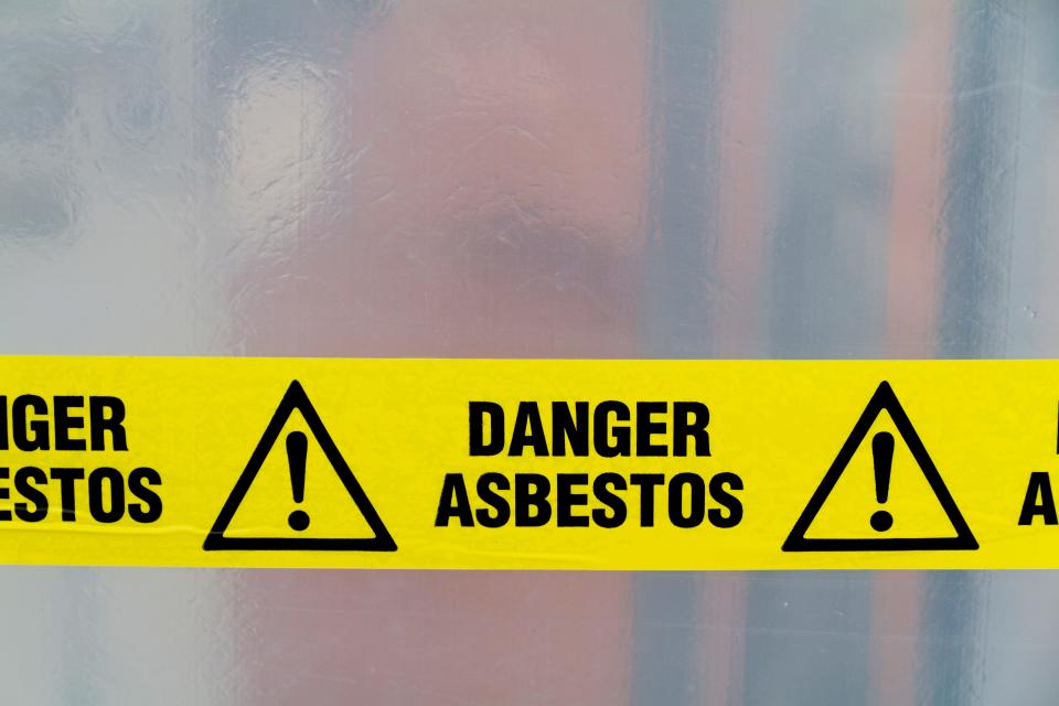 An asbestos warning sign.