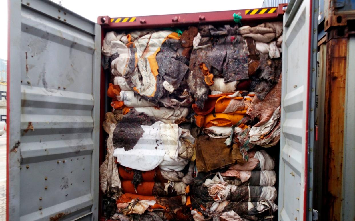 One of the containers opened in Sri Lanka which reportedly contains human remains originating from the UK - AFP