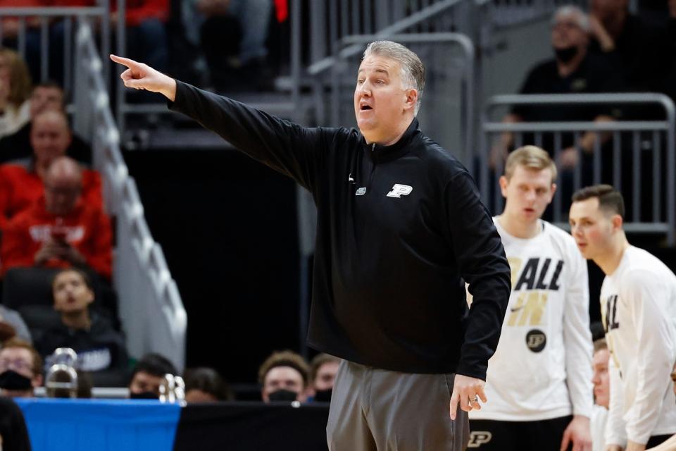 Purdue head coach Matt Painter yells during the first half of a first round NCAA college basketball tournament game against Yale Friday, March 18, 2022, in Milwaukee. (AP Photo/Jeffrey Phelps)