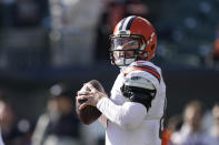 Cleveland Browns quarterback Baker Mayfield throws before an NFL football game between the Cincinnati Bengals and the Cleveland Browns, Sunday, Nov. 7, 2021, in Cincinnati. (AP Photo/Bryan Woolston)