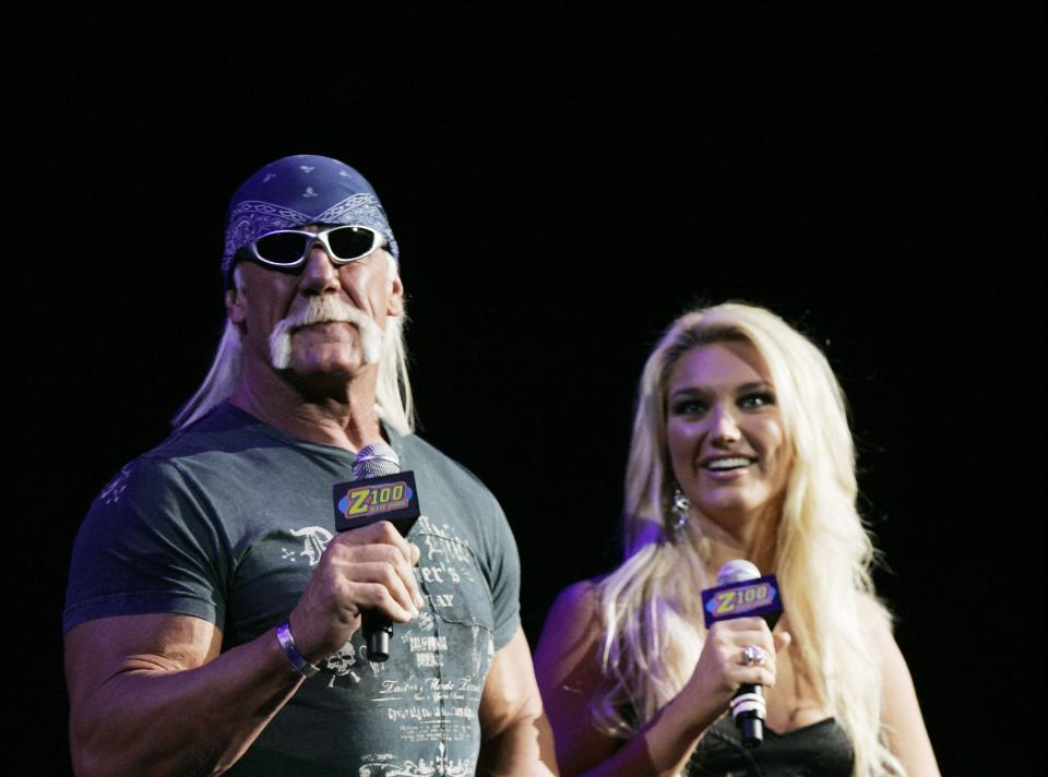 Hulk Hogan, left, appears on stage with his daughter, Brooke Hogan, at Z100s Jingle Ball in New York's Madison Square Garden, Dec. 15, 2006. (AP Photo/Jeff Christensen) She performed at Canton's Thurman Munson Stadium in 2004.