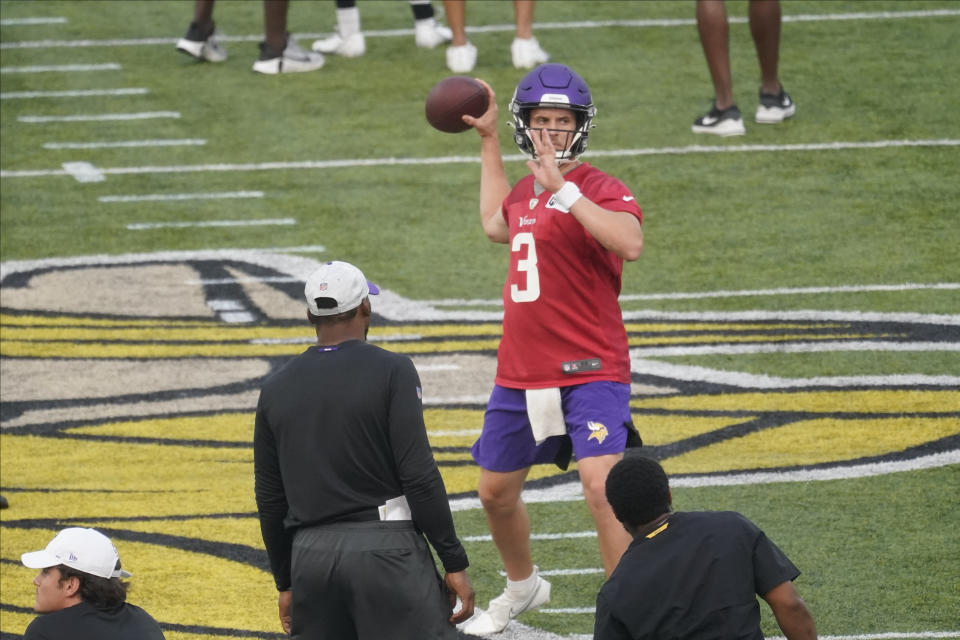 Minnesota Vikings quarterback Jake Browning (3) looks to throw during the team's Back Together Day at NFL football training camp at TCO Stadium, Saturday, July 31, 2021, in Eagan, Minn. (AP Photo/Jim Mone)