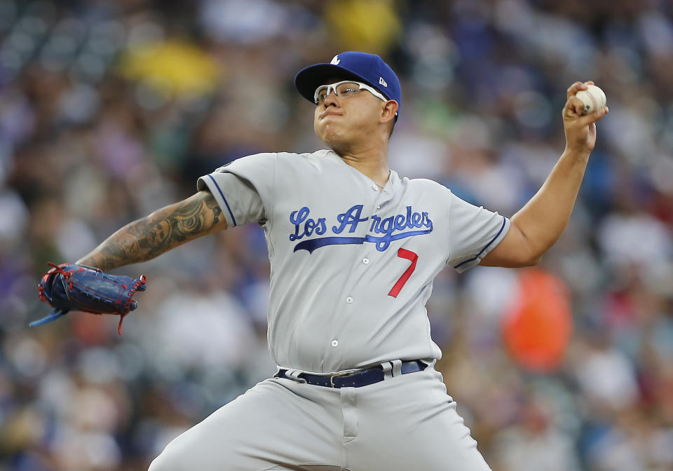 DENVER, CO - JULY 30: Los Angeles Dodgers relief pitcher Julio Urias (7) delivers a pitch during a game between the Colorado Rockies and the visiting Los Angeles Dodgers on July 30, 2019 at Coors Field in Denver, CO.  (Photo by Russell Lansford/Icon Sportswire via Getty Images)