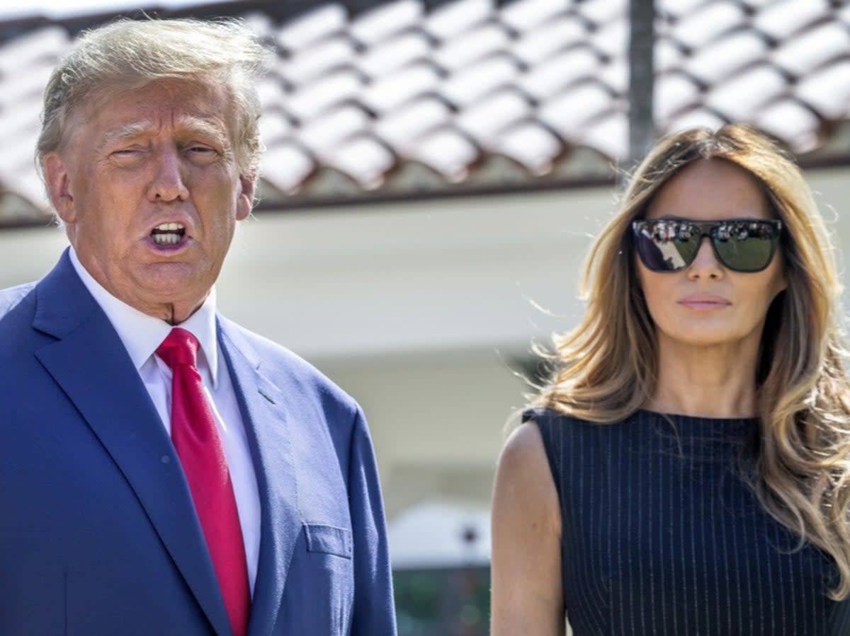 Donald and Melania Trump walk out of a polling station in Palm Beach, Florida, after voting in the 2022 midterm elections (EPA-EFE/Cristobal Herrera-Ulashkevich)