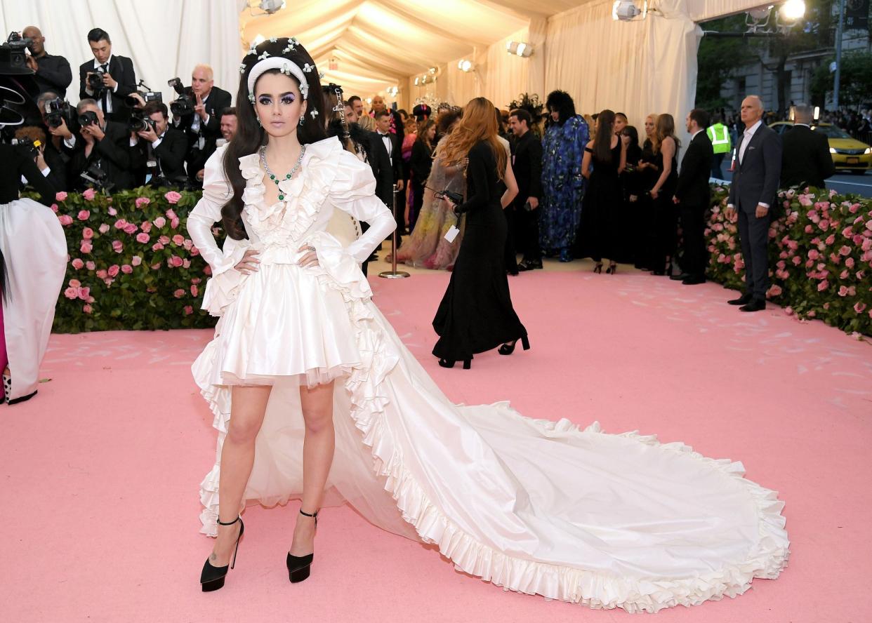 Lily Collins attends The 2019 Met Gala Celebrating Camp: Notes on Fashion at Metropolitan Museum of Art on May 06, 2019 in New York City.