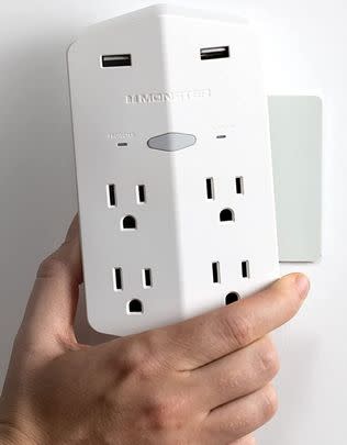 A surge protector that attaches magnetically (!) to your wall and has four outlets and two USB ports