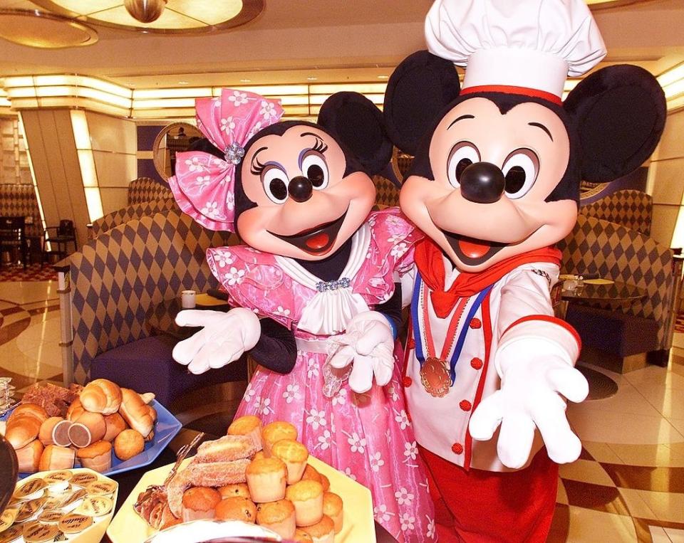 mickey and minnie mouse in restaurant