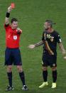 Referee Benjamin Williams of Australia shows Belgium's Steven Defour the red card during their 2014 World Cup Group H soccer match against South Korea at the Corinthians arena in Sao Paulo June 26, 2014. REUTERS/Paulo Whitaker