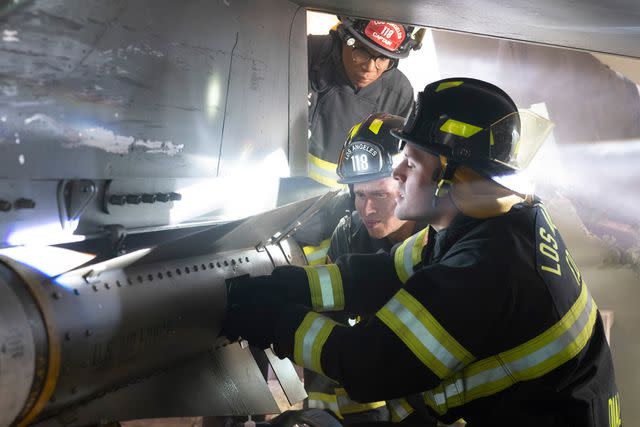 <p>Disney/Chris Willard</p> Aisha Hinds, Oliver Stark, and Ryan Guzman in the '9-1-1' season 7 premiere.