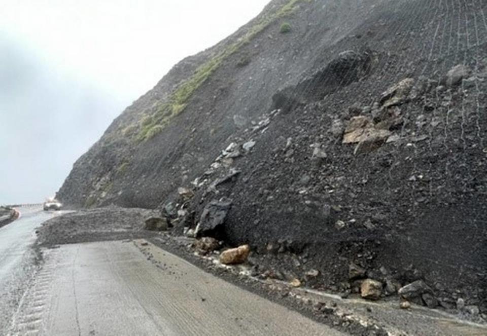 A landslide at the north end of Mud Creek is one of several blocking Highway 1. A boulder the size of shipping container is resting precariously on slide material above the roadway. Mud Creek is the location of a massive slide in 2017 that took more than a year of work and $54 million to repair.