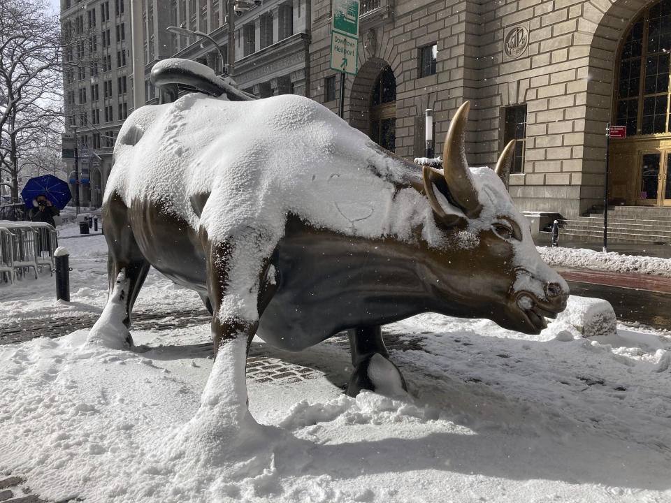 Stocks rise as snow falls in New York City in the Financial District of Lower Manhattan on December 17, 2020. (Photo by: zz/STRF/STAR MAX/IPx via Getty Images)