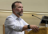 Indiana State head football coach Curt Mallory pauses for a moment as he talks about how the deaths of two football players have affected the team and the ISU community during a news conference, Monday, Aug. 22, 2022, on campus in Terre Haute, Ind. The players were killed in an auto accident the day before in Riley, Ind. (Joseph C. Garza/The Tribune-Star via AP)