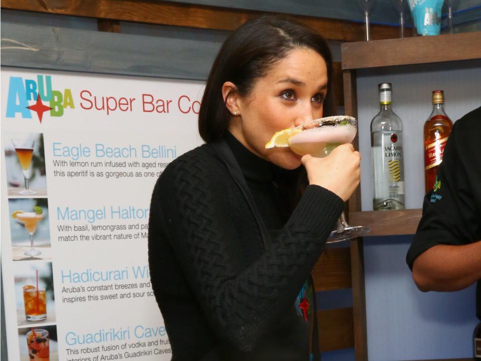 Meghan Markle sipping a cocktail before royal life.