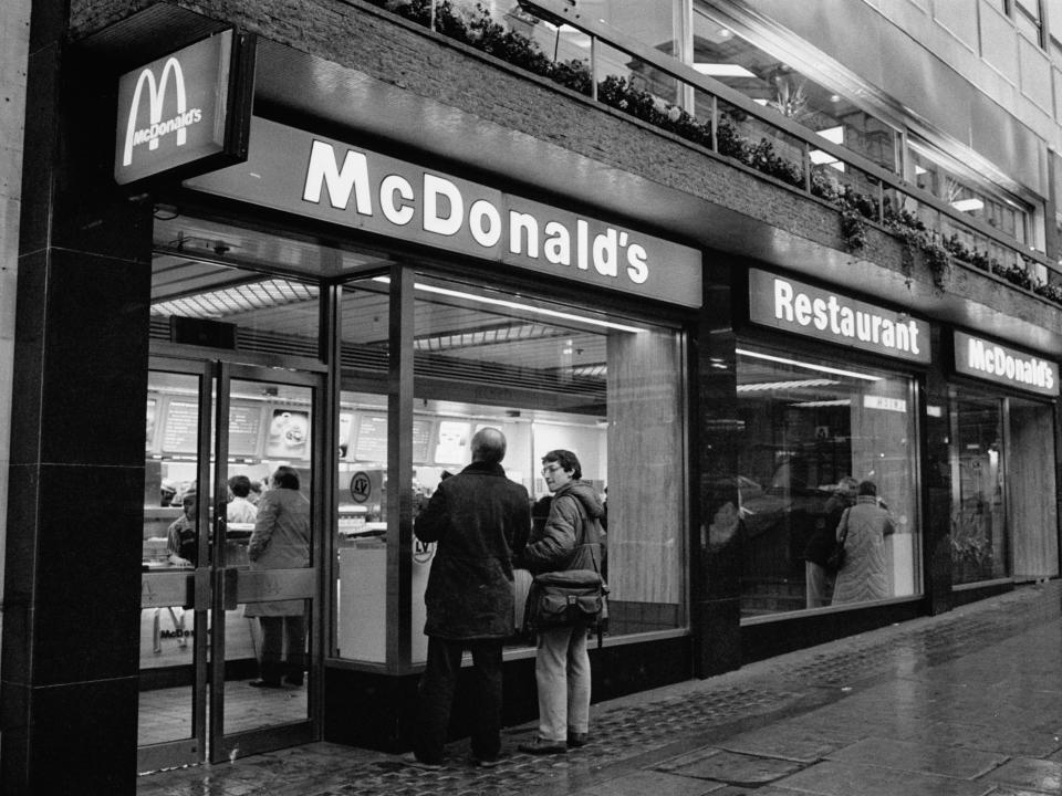 The exterior of a branch of a McDonald's in London in 1985