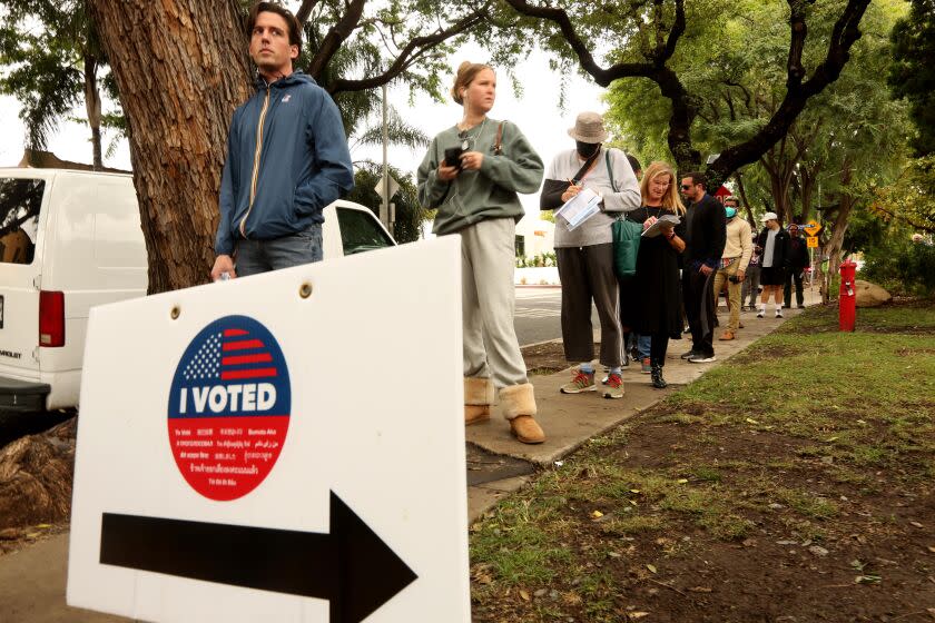 WEST HOLLYWOOD, CA - NOVEMBER 8, 2022 - - Voters wait in line to cast their votes in the midterm elections at Plummer Park in West Hollywood on November 8, 2022. (Genaro Molina / Los Angeles Times)