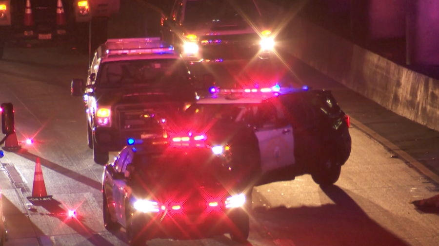 Officers respond to a fatal crash on the 101 Freeway in Hollywood on March 27, 2024.