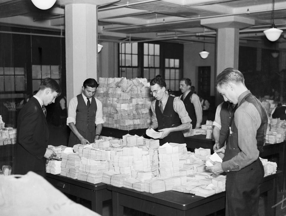 Employees at work establishing individual social security accounts for millions of workers at the wage records office in 1936 | Bettmann/Getty Images