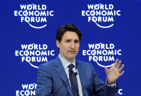 Canada's Prime Minister Justin Trudeau gestures as he speaks during the World Economic Forum (WEF) annual meeting in Davos, Switzerland January 23, 2018 REUTERS/Denis Balibouse