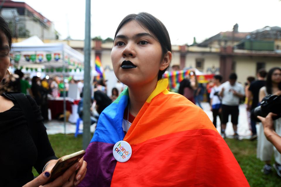 Participants gather for a gay pride parade to advocate gay rights in Hanoi on November 11, 2018. (Photo by Nhac NGUYEN / AFP) (Photo credit should read NHAC NGUYEN/AFP via Getty Images)