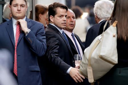 SkyBridge Capital CEO Anthony Scaramucci (C) stands outside the Le Cirque restaurant with others before a fundraising event for Republican presidential candidate Donald Trump in Manhattan, New York City, U.S., June 21, 2016. REUTERS/Mike Segar