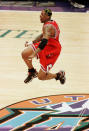 SALT LAKE CITY, UNITED STATES: Dennis Rodman of the Chicago Bulls leaps in the air 14 June as he celebrates after the Bulls won game six of the NBA Finals against the Utah Jazz at the Delta Center in Salt Lake City, UT. The Bulls won the game 87-86 for their sixth NBA Championship. AFP PHOTO/Mike NELSON (Photo credit should read MIKE NELSON/AFP via Getty Images)