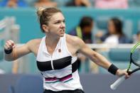 Mar 24, 2019; Miami Gardens, FL, USA; Simona Halep of Romania celebrates after winning the second set against Polona Hercog of Slovenia (not pictured) in the third round of the Miami Open at Miami Open Tennis Complex. Mandatory Credit: Geoff Burke-USA TODAY Sports