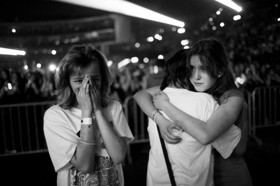 Young fans crying during the show. <b>More on Time.com:</b> <a href="http://www.time.com/time/photogallery/0,29307,2053165,00.html" rel="nofollow noopener" target="_blank" data-ylk="slk:Photos: Colin Firth: The Thinking Ladies' Leading Man;elm:context_link;itc:0;sec:content-canvas" class="link ">Photos: Colin Firth: The Thinking Ladies' Leading Man</a>