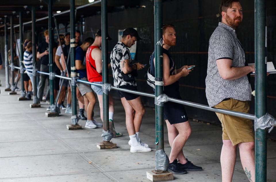 People line up for monkeypox vaccines at the opening of a mass vaccination site at the Bushwick Education Campus in Brooklyn, New York.