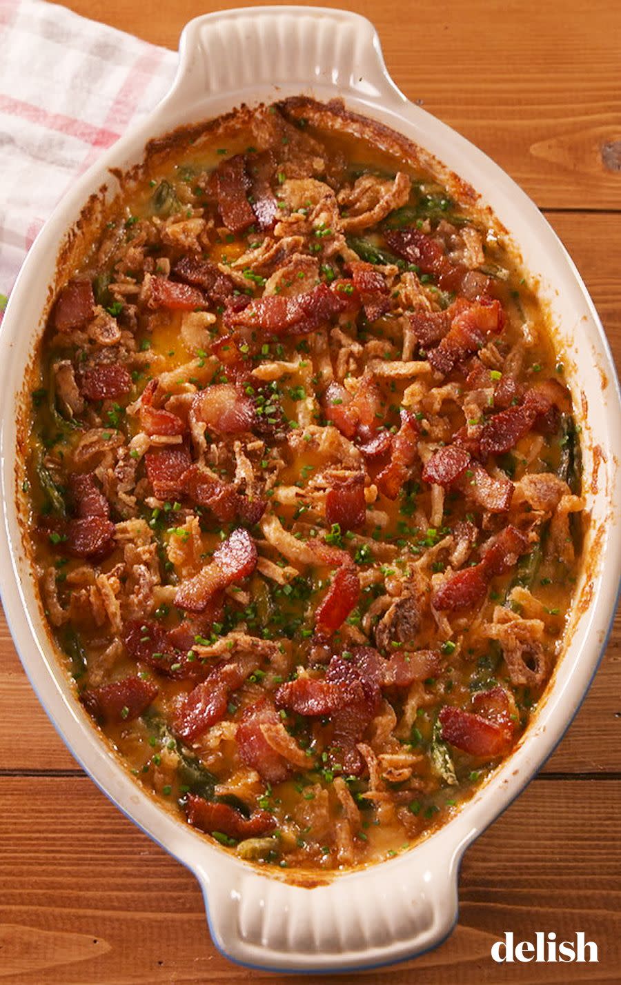 <p>Wave goodbye to that can of cream of mushroom soup and meet your new favorite <a href="https://www.delish.com/holiday-recipes/g3006/green-bean-casserole-recipes/" rel="nofollow noopener" target="_blank" data-ylk="slk:green bean casserole;elm:context_link;itc:0;sec:content-canvas" class="link ">green bean casserole</a>! It's got bacon, chives, and SO much cheese. If you've got vegetarian company, feel free to leave the bacon out—it's got plenty of cheese to make up for it. 😏</p><p>Get the <strong><a href="https://www.delish.com/holiday-recipes/thanksgiving/a24399597/loaded-green-bean-casserole-recipe/" rel="nofollow noopener" target="_blank" data-ylk="slk:Loaded Green Bean Casserole recipe;elm:context_link;itc:0;sec:content-canvas" class="link ">Loaded Green Bean Casserole recipe</a></strong>.</p>