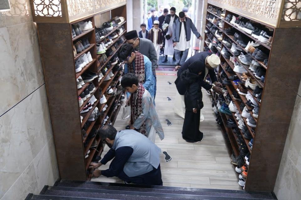 Shoes are removed before entering the mosque (Danny Lawson/PA) (PA Wire)