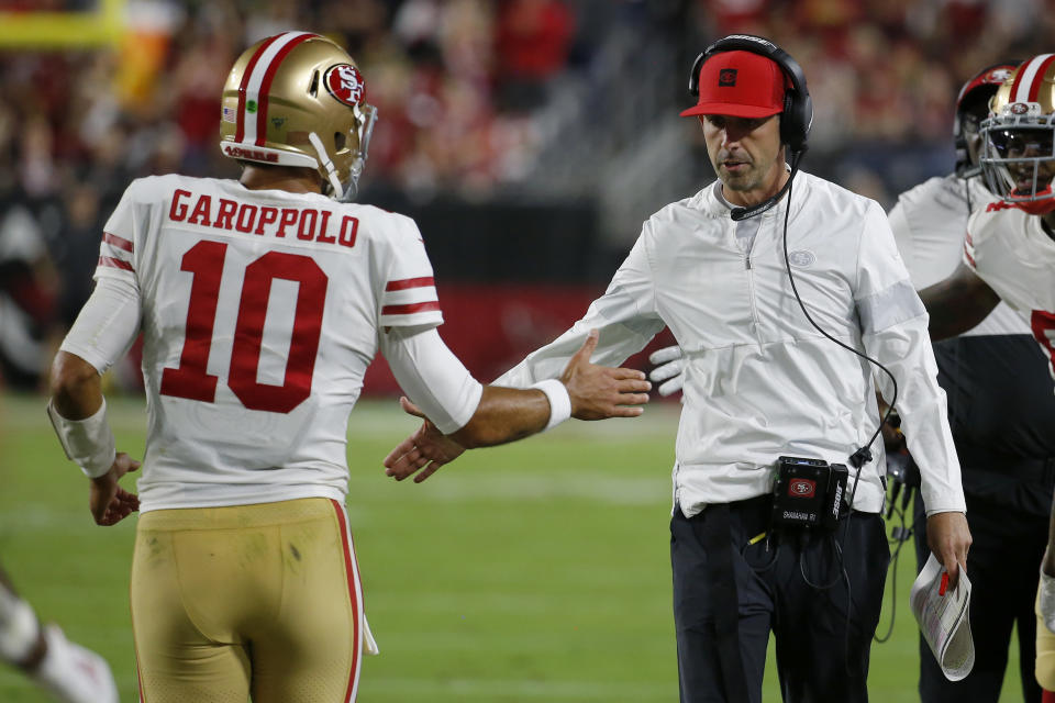 San Francisco 49ers quarterback Jimmy Garoppolo (10) greets head coach Kyle Shanahan after a touchdown. (AP Photo/Rick Scuteri)