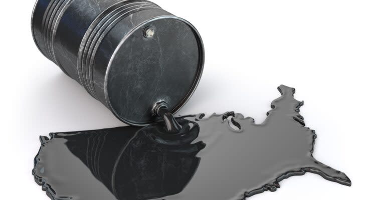 Oil barrel and spilled oil in form of United States isolated on white; oil stocks