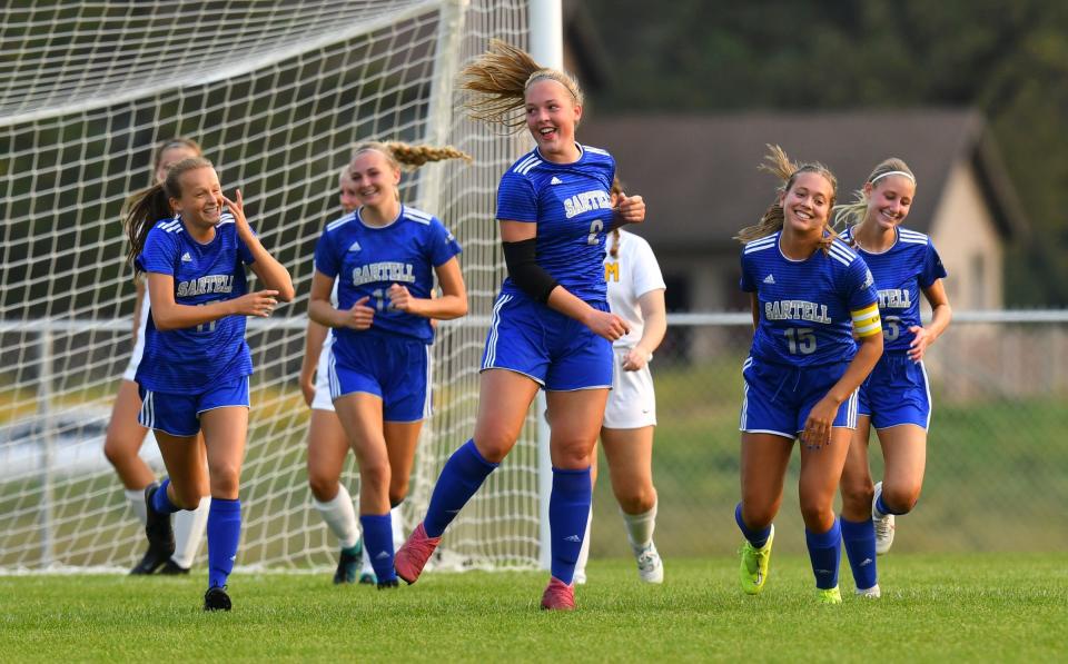 Sartell's Reese Kloetzer celebrates a first-half goal during the game Tuesday, Sept. 15, 2020, against Sauk Rapids at Sartell High School. 