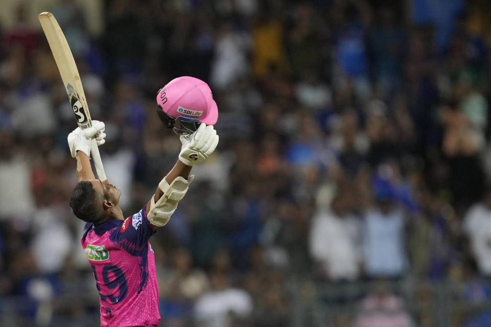 Rajasthan Royals' Yashasvi Jaiswal celebrates after scoring a century during the Indian Premier League cricket match between Mumbai Indians and Rajasthan Royals in Mumbai, India, Sunday, April 30, 2023. (AP Photo/Rajanish Kakade)