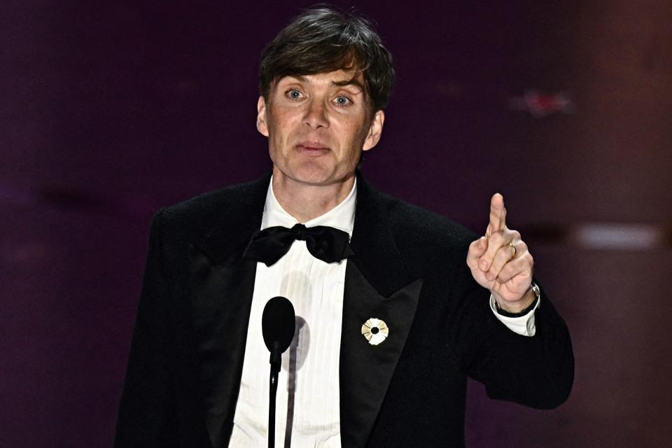 <p>PATRICK T. FALLON/AFP via Getty</p> Cillian Murphy accepting the award for Best Actor at the 2024 Oscars