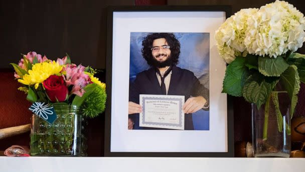 PHOTO: A portrait of Karim Abou Najm stands amid flowers on the fireplace mantel of his family home in Davis, Calif., May 1, 2023. (The Sacramento Bee/TNS via Newscom)