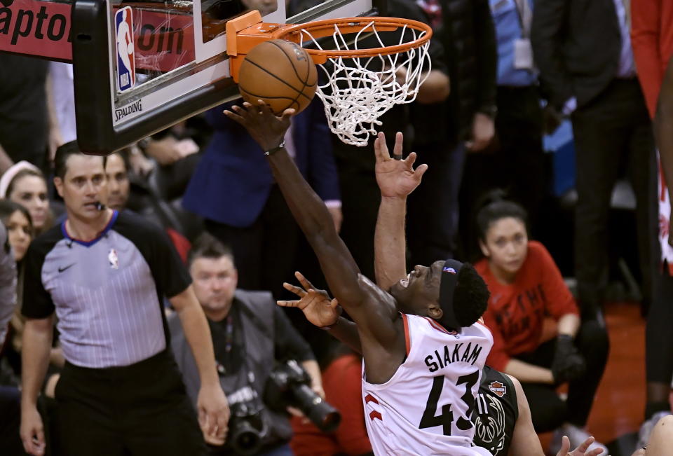 Toronto Raptors forward Pascal Siakam (43) recovers the ball after it hit the rim during the second half of Game 6 of the team's NBA basketball playoffs Eastern Conference finals against the Milwaukee Bucks on Saturday, May 25, 2019, in Toronto. (Frank Gunn/The Canadian Press via AP)