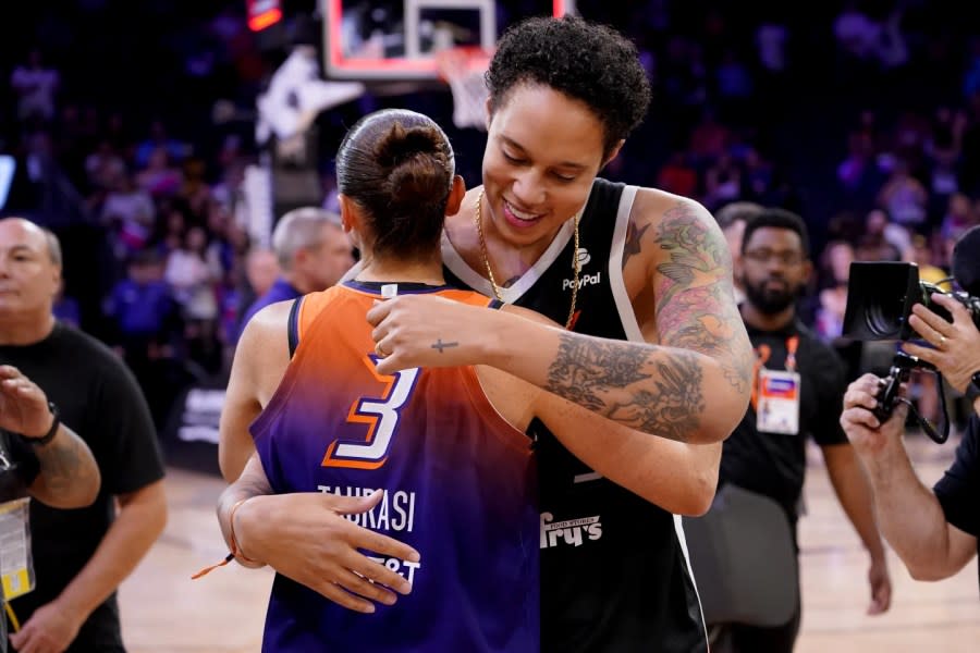 Phoenix Mercury guard Diana Taurasi (3) hugs Brittney Griner after the team’s WNBA basketball game against the Atlanta Dream, Aug. 3, 2023, in Phoenix. (AP Photo/Matt York, File)