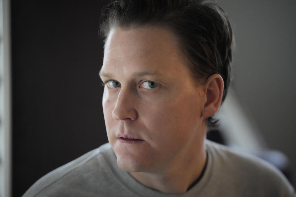 Shawn Blymiller, poses for a photograph on Wednesday, Feb. 15, 2023, in Salt Lake City. Blymiller, a 39-year-old father of two from suburban Salt Lake City, said he started magic mushroom therapy for treatment-resistant depression after becoming disillusioned with traditional anti-depressants. Lawmakers throughout the United States are weighing proposals to legalize psychedelic mushrooms for people. (AP Photo/Rick Bowmer)