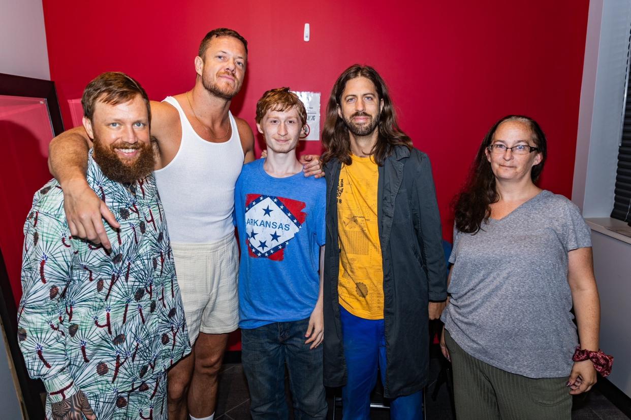 Mason DeBauche (third from left) and his mother Tiffany (far right) with Imagine Dragons at Summerfest in Milwaukee.