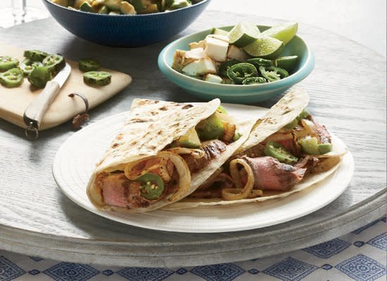 <strong>Get the <a href="http://www.huffingtonpost.com/2011/10/27/grilled-steak-tacos-with-_n_1058467.html" target="_hplink">Grilled Steak Tacos with Avocado Salsa</a> recipe by Quentin Bacon from Food & Wine</strong>