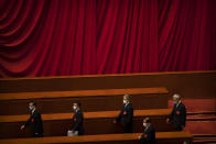 Delegates arrive for the closing session of China's National People's Congress (NPC) at the Great Hall of the People in Beijing, Thursday, May 28, 2020. China's ceremonial legislature has endorsed a national security law for Hong Kong that has strained relations with the United States and Britain. (AP Photo/Mark Schiefelbein)