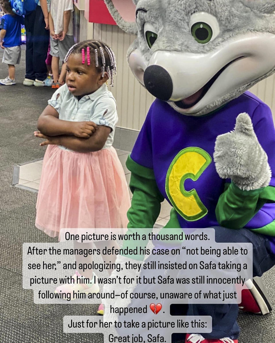 Image: Safa, the toddler in the viral video, with the Chuck E. Cheese mascot. (Courtesy Natyana Muhammad)