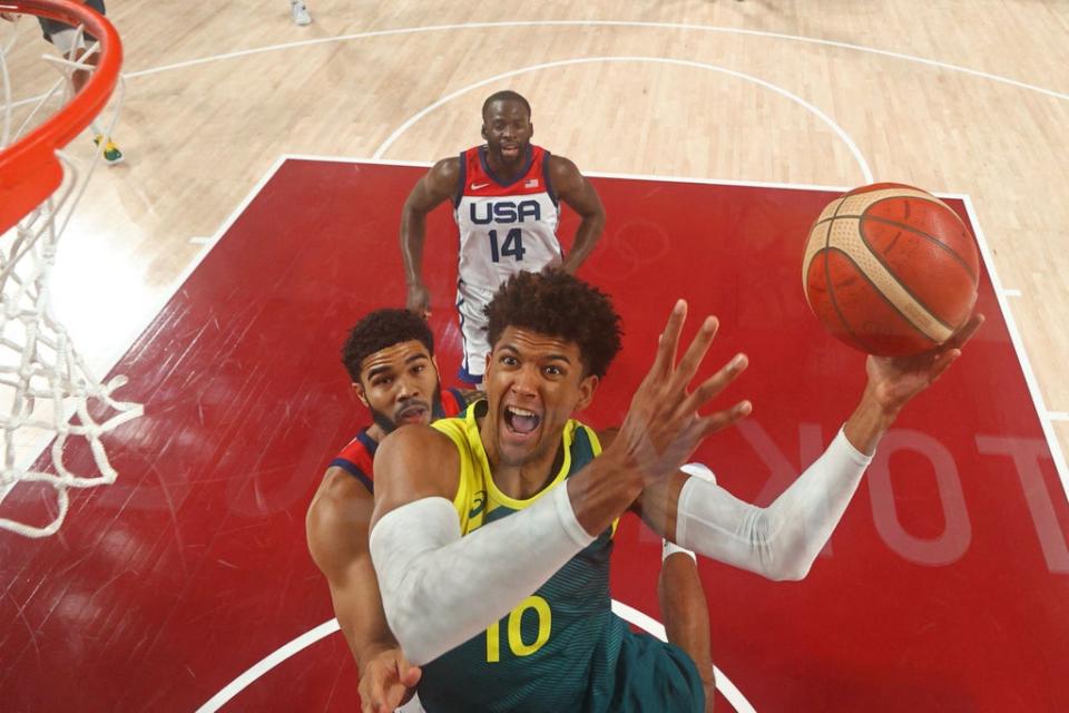 Matisse Thybulle goes to the basket past Jayson Tatum (Getty)