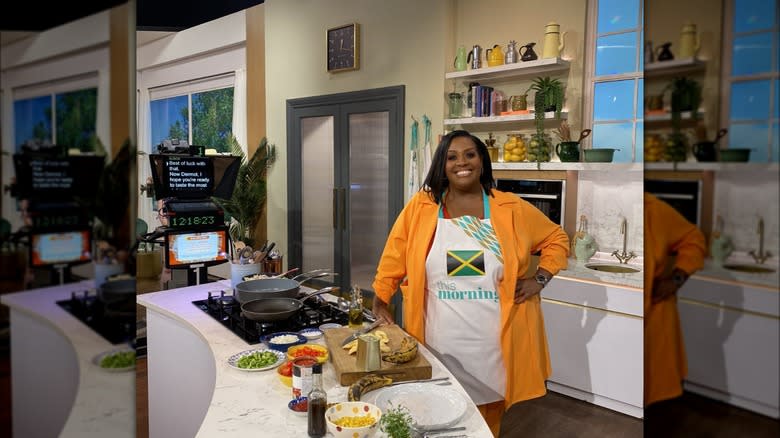 Alison Hammond in kitchen wearing apron